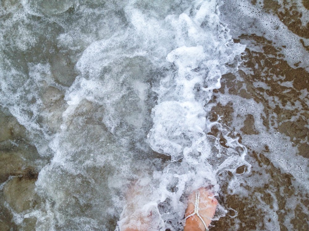 My feet, in the ocean, for the very first time!